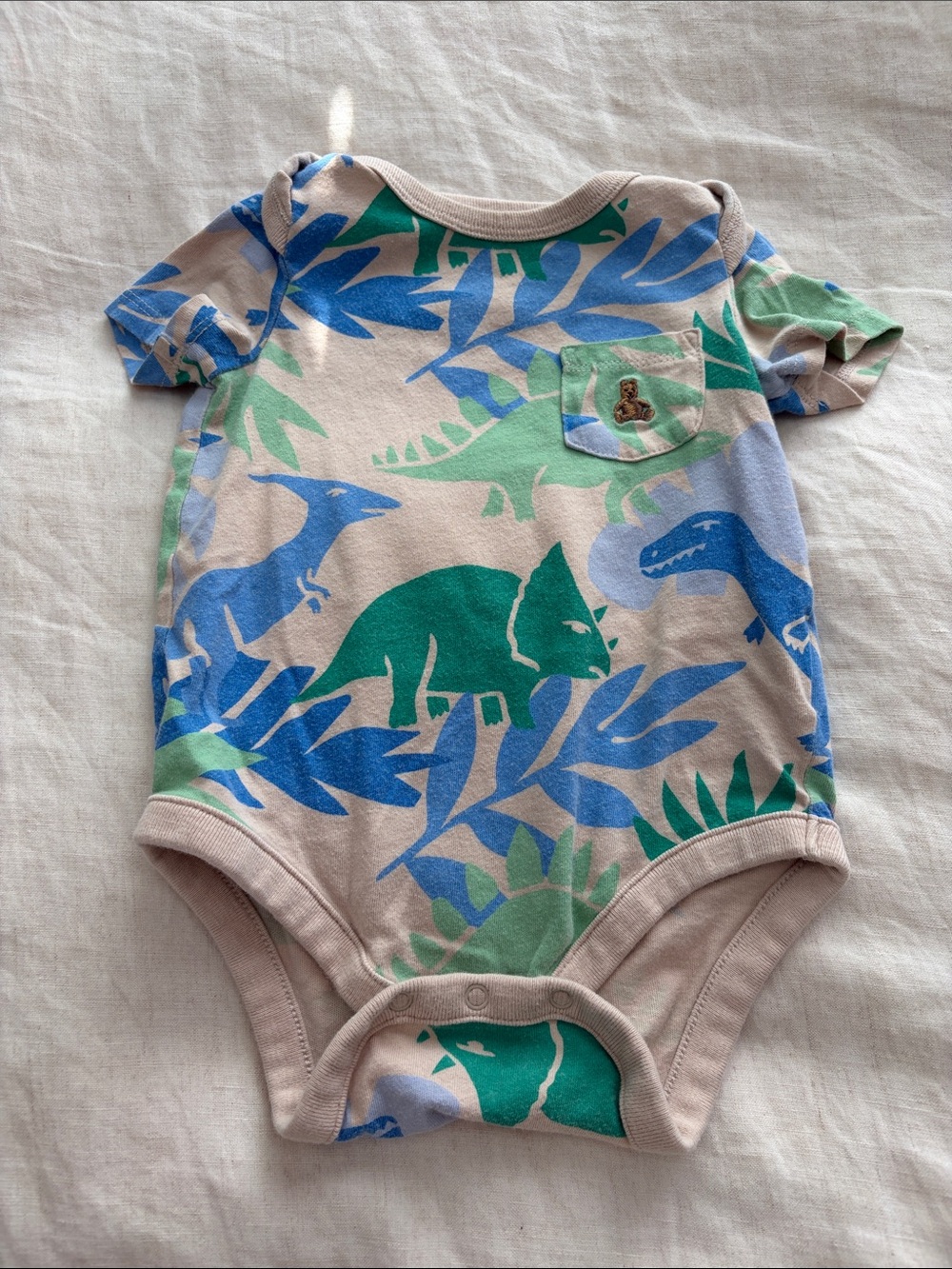 GAP Dinosaur Print One-Piece Bodysuit in Beige, Blue & Green